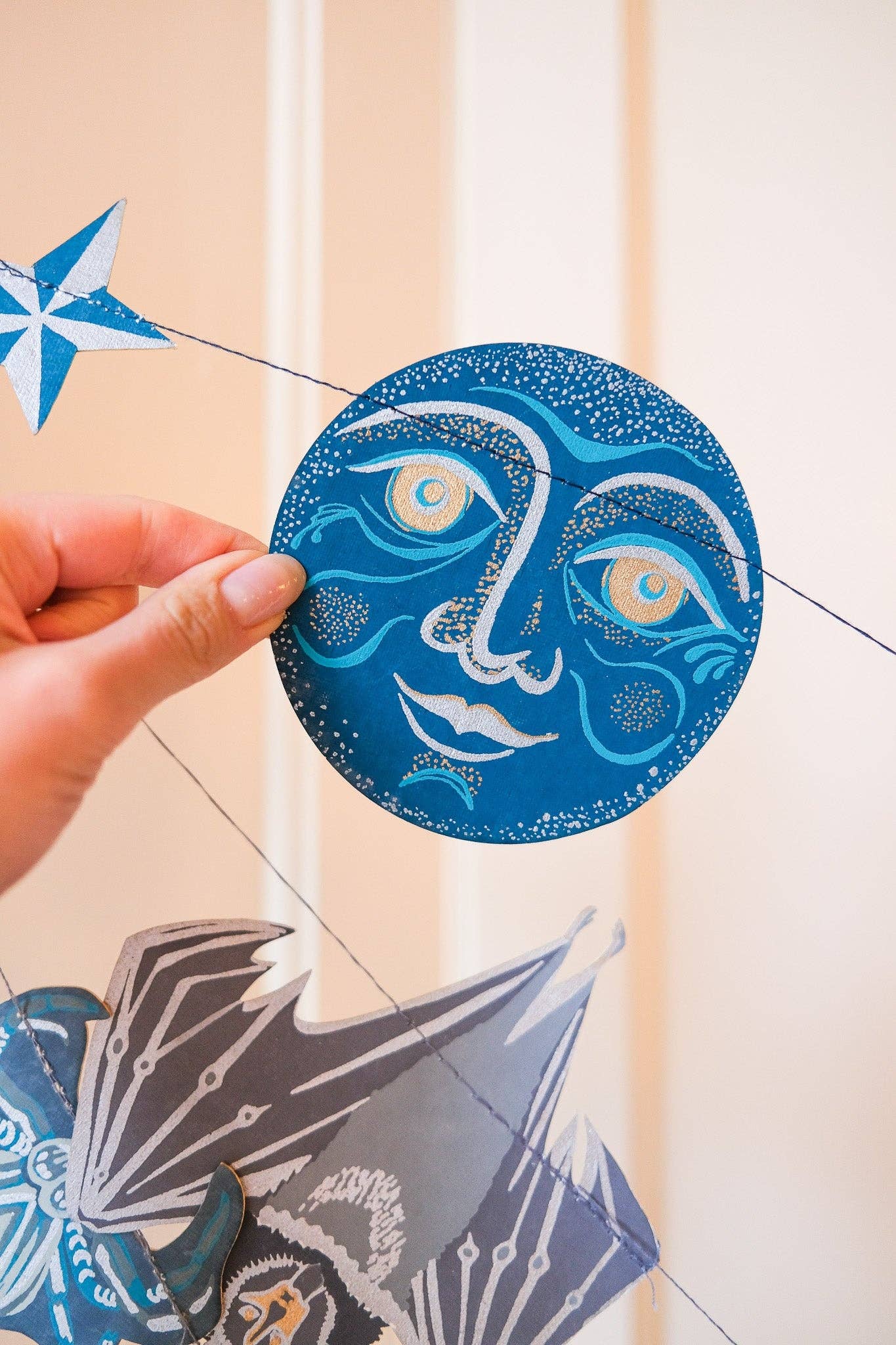 MAN ON THE MOON SEWN GARLAND